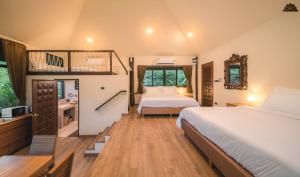 Postel nebo postele na pokoji v ubytování Kenaray Farmstay riverside