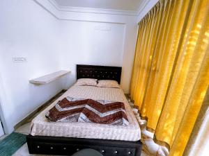 Postel nebo postele na pokoji v ubytování RVR Abode -Private Rooms