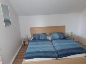 Giường trong phòng chung tại Nordsteg