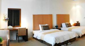 Ecograd Hotel客房内的一张或多张床位