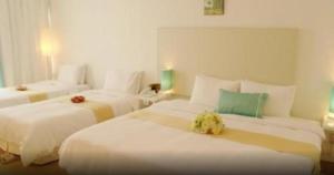 Ecograd Hotel客房内的一张或多张床位