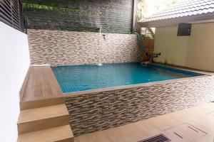 Bazén v ubytování 2 Storey Semi-D Homestay Nilai and KLIA, F1 Sepang with Pool nebo v jeho okolí + 9 fotografií