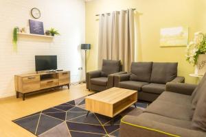 Khu vực ghế ngồi tại 2 Storey Semi-D Homestay Nilai and KLIA, F1 Sepang with Pool