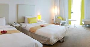 Ecograd Hotel客房内的一张或多张床位