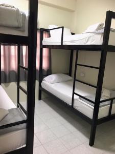 Postel nebo postele na pokoji v ubytování Holiday Phangan - Hostel & Bar