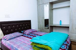 Postel nebo postele na pokoji v ubytování RVR Abode -Private Rooms