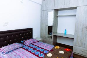 Postel nebo postele na pokoji v ubytování RVR Abode -Private Rooms