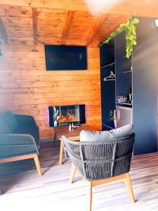 Televízia a/alebo spoločenská miestnosť v ubytovaní Tropical Spa