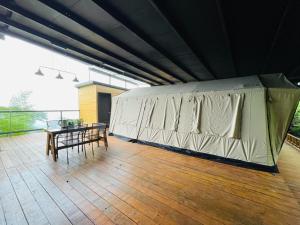 Balkón nebo terasa v ubytování 深山林內民宿