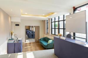 Khu vực ghế ngồi tại Darley Hotel Chiangmai