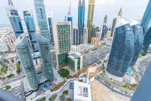 Nespecifikovaný výhled na destinaci Dubaj nebo výhled na město při pohledu z apartmánu
