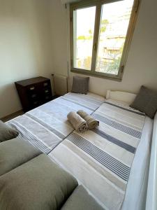 Postel nebo postele na pokoji v ubytování Appartement vue mer panoramique