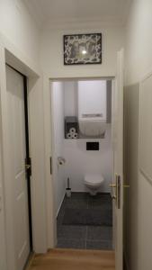 A bathroom at Pink Lotus Apartment