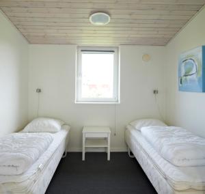 Postel nebo postele na pokoji v ubytování Lalandia Billund