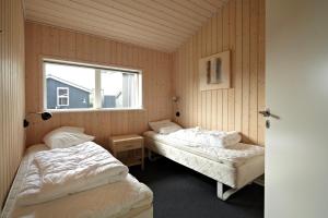 Postel nebo postele na pokoji v ubytování Lalandia Billund