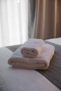 Posteľ alebo postele v izbe v ubytovaní Minos by Agora Luxury Apartments in the heart of Heraklion