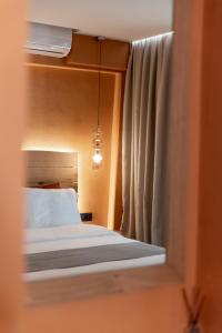 Posteľ alebo postele v izbe v ubytovaní Minos by Agora Luxury Apartments in the heart of Heraklion