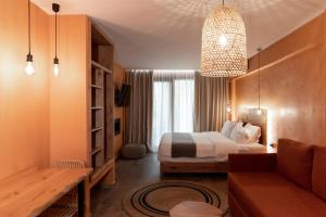 Posteľ alebo postele v izbe v ubytovaní Minos by Agora Luxury Apartments in the heart of Heraklion