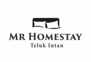 Een teken voor het logo van de familie teliki. bij MR Homestay HotelStyle Room Teluk Intan in Teluk Intan