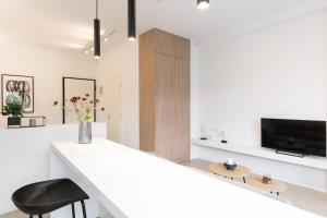 TV a/nebo společenská místnost v ubytování Voda Luxury Residence #101