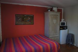 Posteľ alebo postele v izbe v ubytovaní Chambre Coeur de Ville