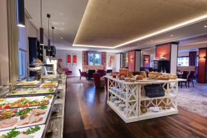 a buffet line with many different types of food at WILLINO Privathotel in Willingen
