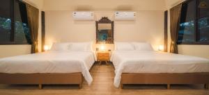 Postel nebo postele na pokoji v ubytování Kenaray Farmstay riverside