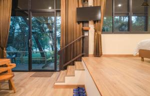 TV a/nebo společenská místnost v ubytování Kenaray Farmstay riverside