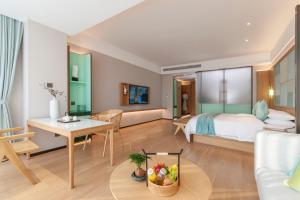 TV o dispositivi per l'intrattenimento presso SSAW Boutique Hotel Zhijiang