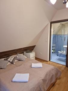 Posteľ alebo postele v izbe v ubytovaní Villa Broniewskiego