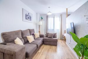 TV a/nebo společenská místnost v ubytování CARTAGENAFLATS, Apartamentos Anfiteatro Romano 5B