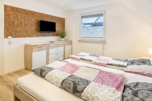 Postel nebo postele na pokoji v ubytování Ferienwohnung Katzmaier