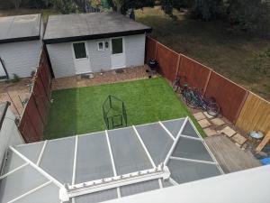 an overhead view of a basketball court in a backyard at 32 in Ashford
