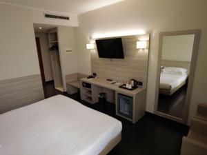 Giường trong phòng chung tại Best Western Park Hotel