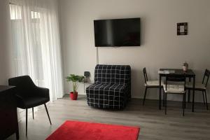 Posedenie v ubytovaní New Blue Danube Apartment with Balcony and Parking