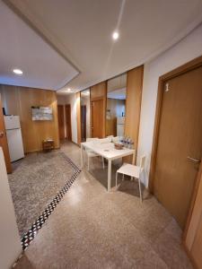 Kuchyňa alebo kuchynka v ubytovaní eXperience Rooms Valencia + 14 fotografií