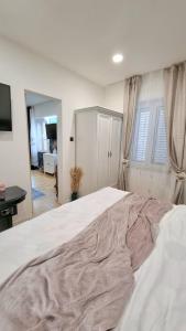 Postel nebo postele na pokoji v ubytování PLACE 4 U Studio Center