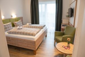 Voodi või voodid majutusasutuse Hotel Am Deich toas