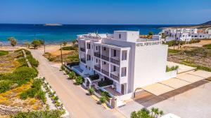 an aerial view of a hotel on the beach at Porto Diakofti in Diakofti