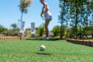 Golfe no resort ou nos arredores