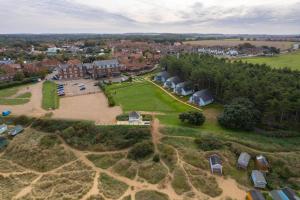 an aerial view of a large estate with houses at Old Hunstanton Le Strange Arms Hotel in Hunstanton