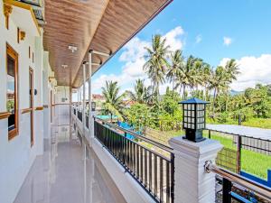 a view from the balcony of a house at Super OYO 92101 Elma Guesthouse in Yogyakarta