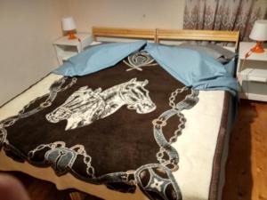 מיטה או מיטות בחדר ב-Christos
