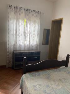 Postel nebo postele na pokoji v ubytování Pousada Fraga
