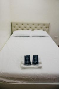 Cama o camas de una habitación en Cocoland Farm and Resort
