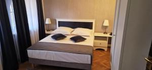 Katil atau katil-katil dalam bilik di Hotel Triumf