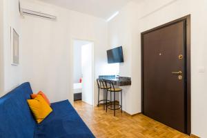 Televízia a/alebo spoločenská miestnosť v ubytovaní Center of Athens: Iris cozy apartment