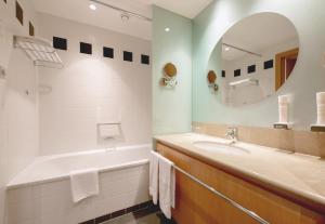 Koupelna v ubytování Das Sonnreich - Thermenhotel Loipersdorf