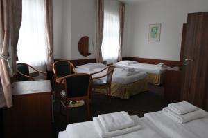 Voodi või voodid majutusasutuse Hotel Skála toas