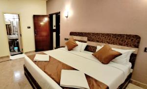 Voodi või voodid majutusasutuse IHotels Yercaud toas